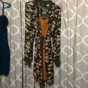 Dress with camouflage jacket.